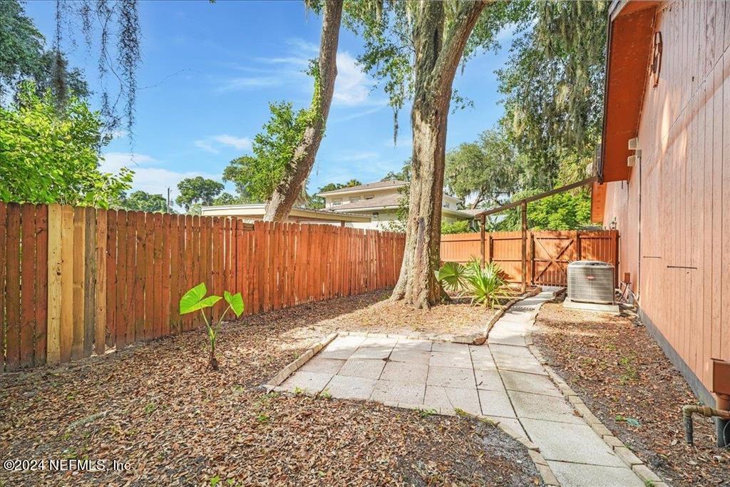 123 Unicorn Road St. Augustine, FL 32086 - Photo 36 of 51 a view of a backyard with a patio