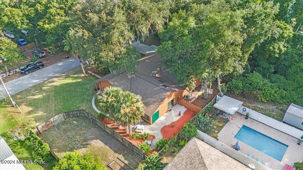 123 Unicorn Road St. Augustine, FL 32086 - Photo 48 of 51 an aerial view of a house with a garden