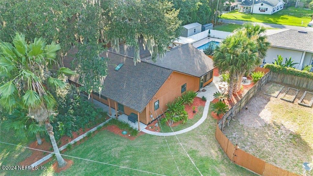 123 Unicorn Road St. Augustine, FL 32086 - Photo 49 of 51 an aerial view of a house with outdoor space pool seating area and yard