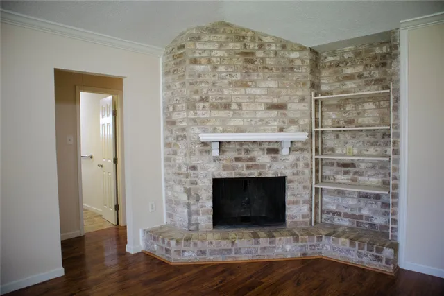 a living room with a fireplace