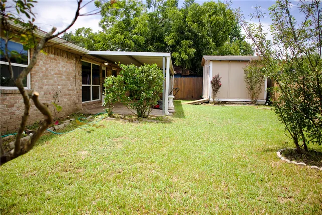 a house with trees in front of it
