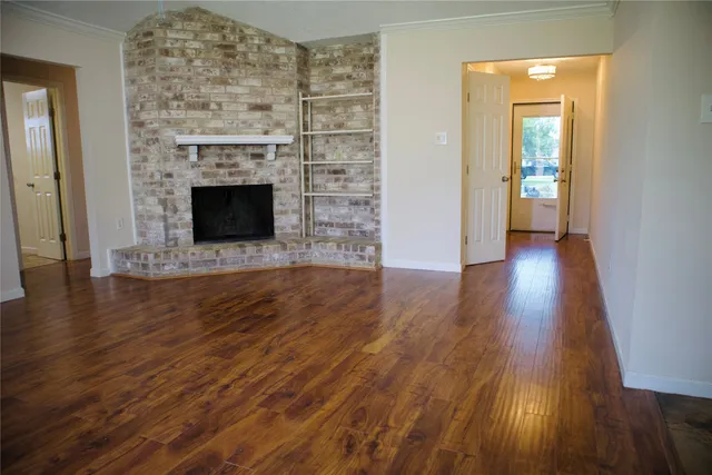 wooden floor fireplace and natural light