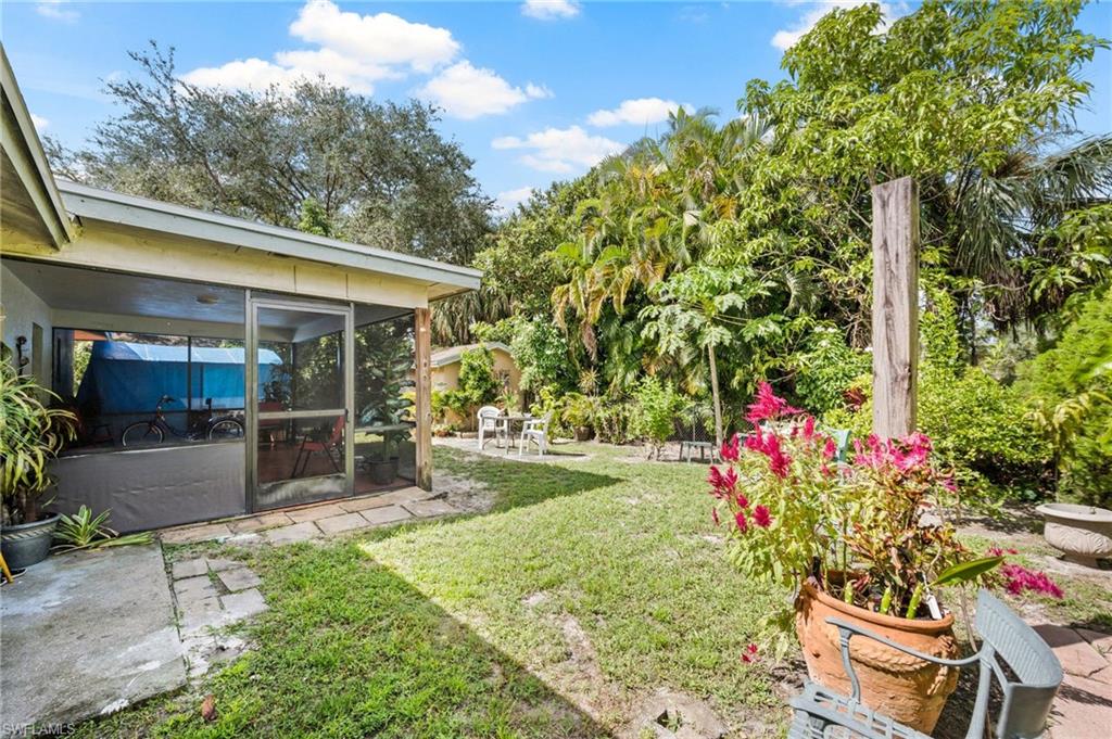 2285 50th Street Southwest Naples, FL 34116 - Photo 24 of 29 Canal behind foliage