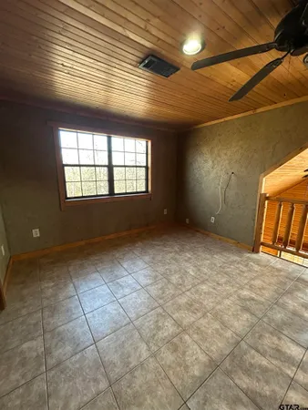 an empty room with windows