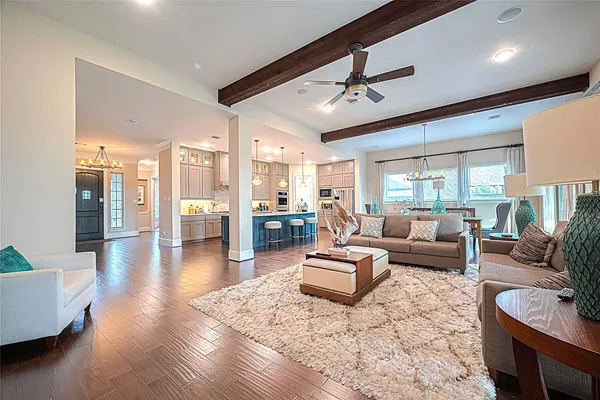 a view of an chairs and table in the patio