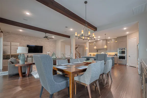 a kitchen with stainless steel appliances granite countertop a stove and refrigerator