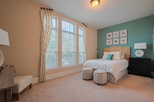 a bathroom with a granite countertop sink mirror and shower
