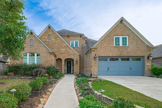 a living room with furniture or couch and a wooden floor