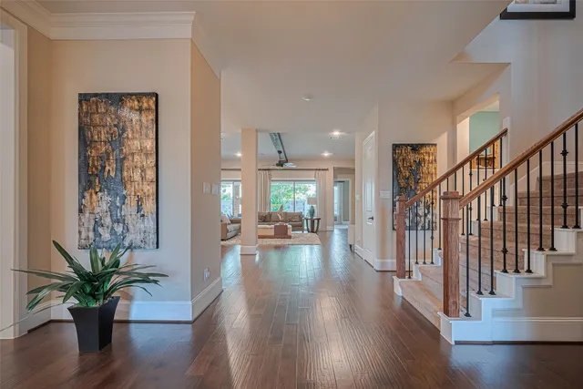 a view of an outdoor dining space with furniture and garden