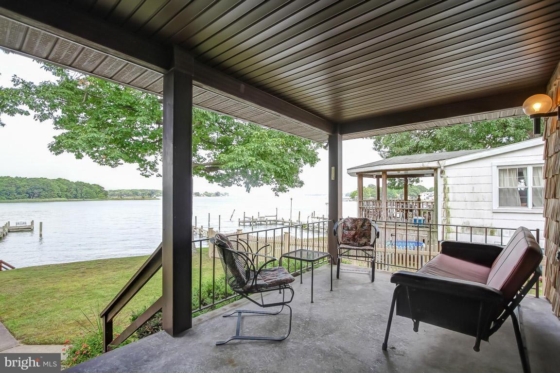 1701 Wilson Point Road Baltimore, MD 21220 - Photo 20 of 27 a view of a two chairs in the balcony