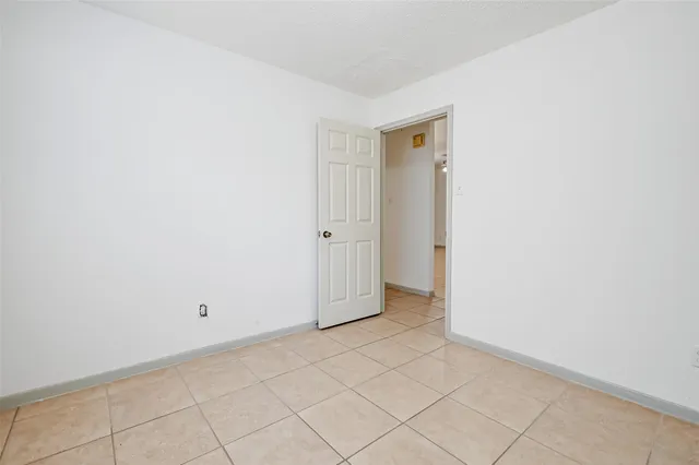 an empty room with white door