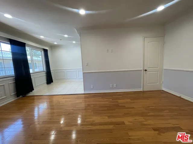 a view of a room with an empty space