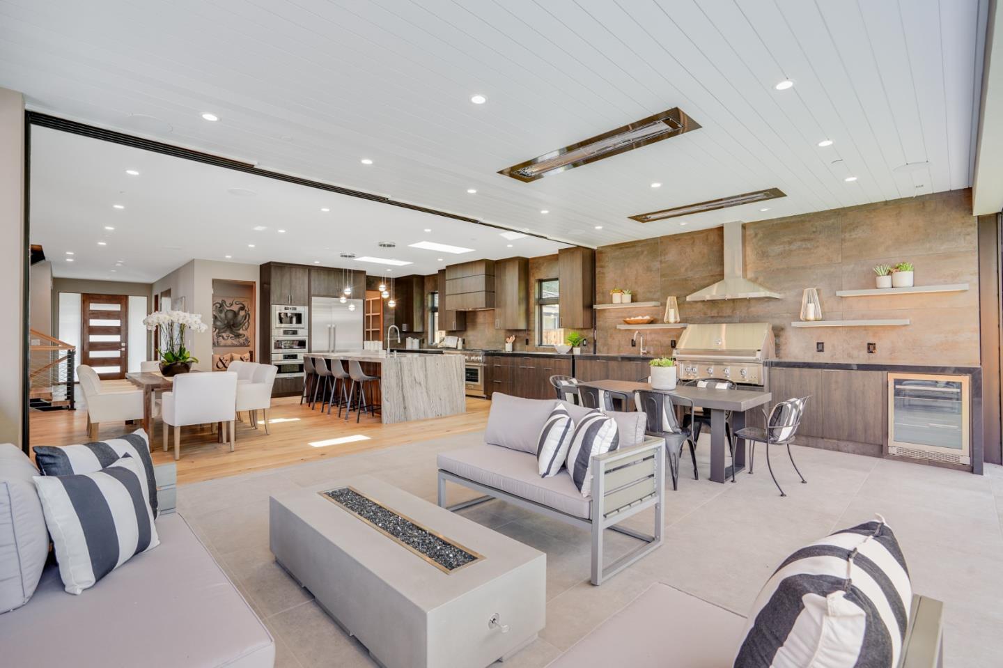 67 Lyell Street Los Altos, CA 94022 - Photo 11 of 31 a living room with furniture and kitchen view