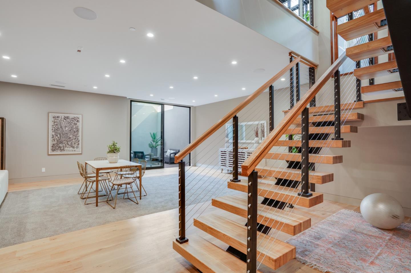 67 Lyell Street Los Altos, CA 94022 - Photo 13 of 31 a view of entryway and hall with wooden floor