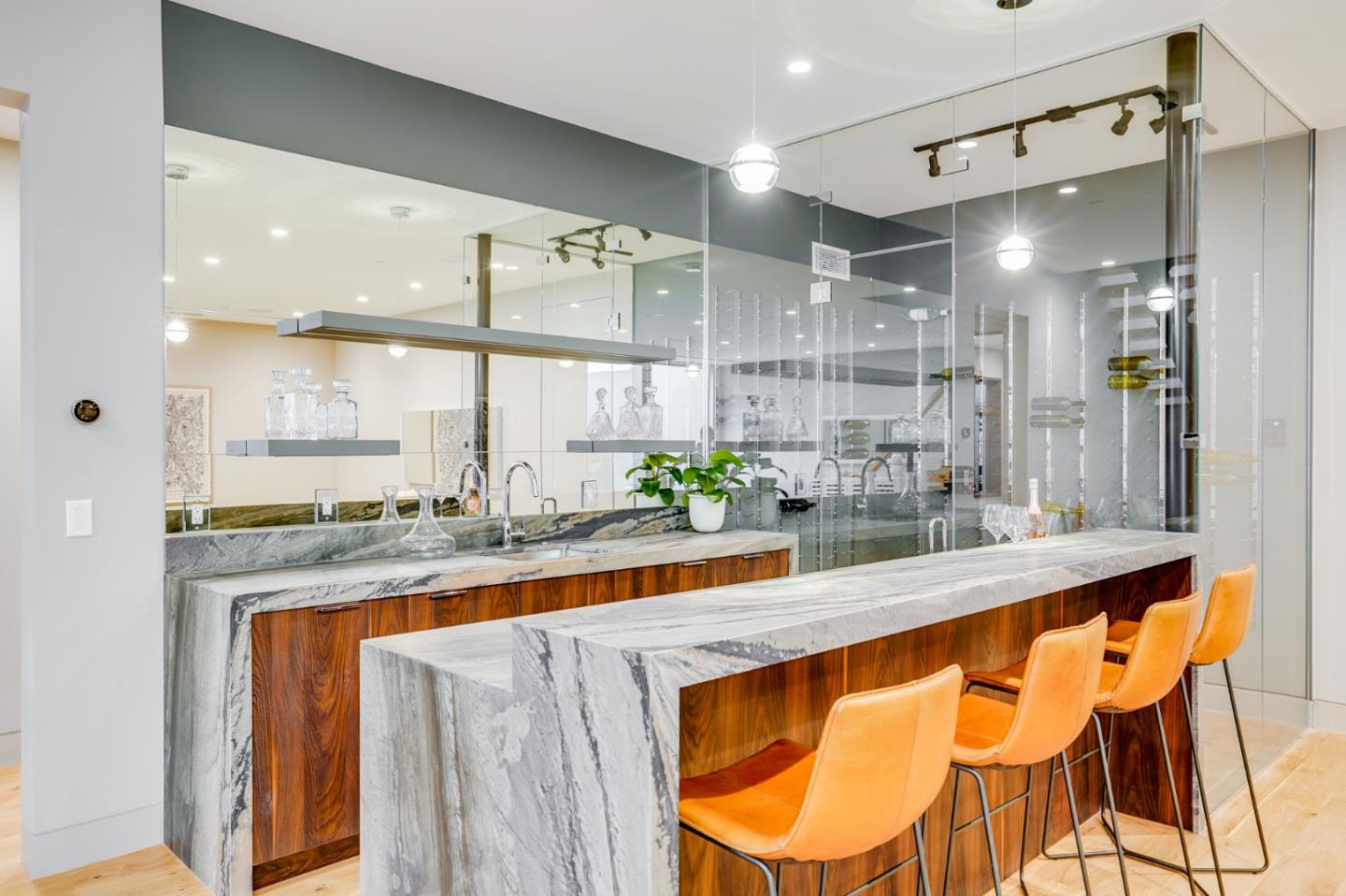67 Lyell Street Los Altos, CA 94022 - Photo 16 of 31 a kitchen with stainless steel appliances granite countertop a sink and cabinets