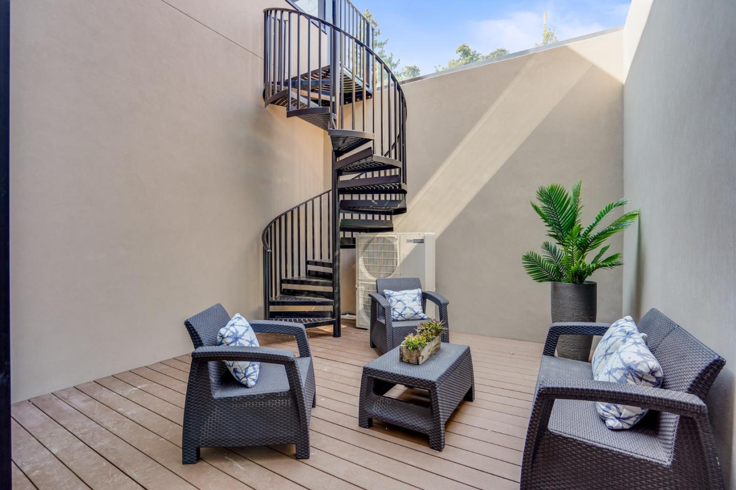67 Lyell Street Los Altos, CA 94022 - Photo 18 of 31 a living room with furniture and wooden floor