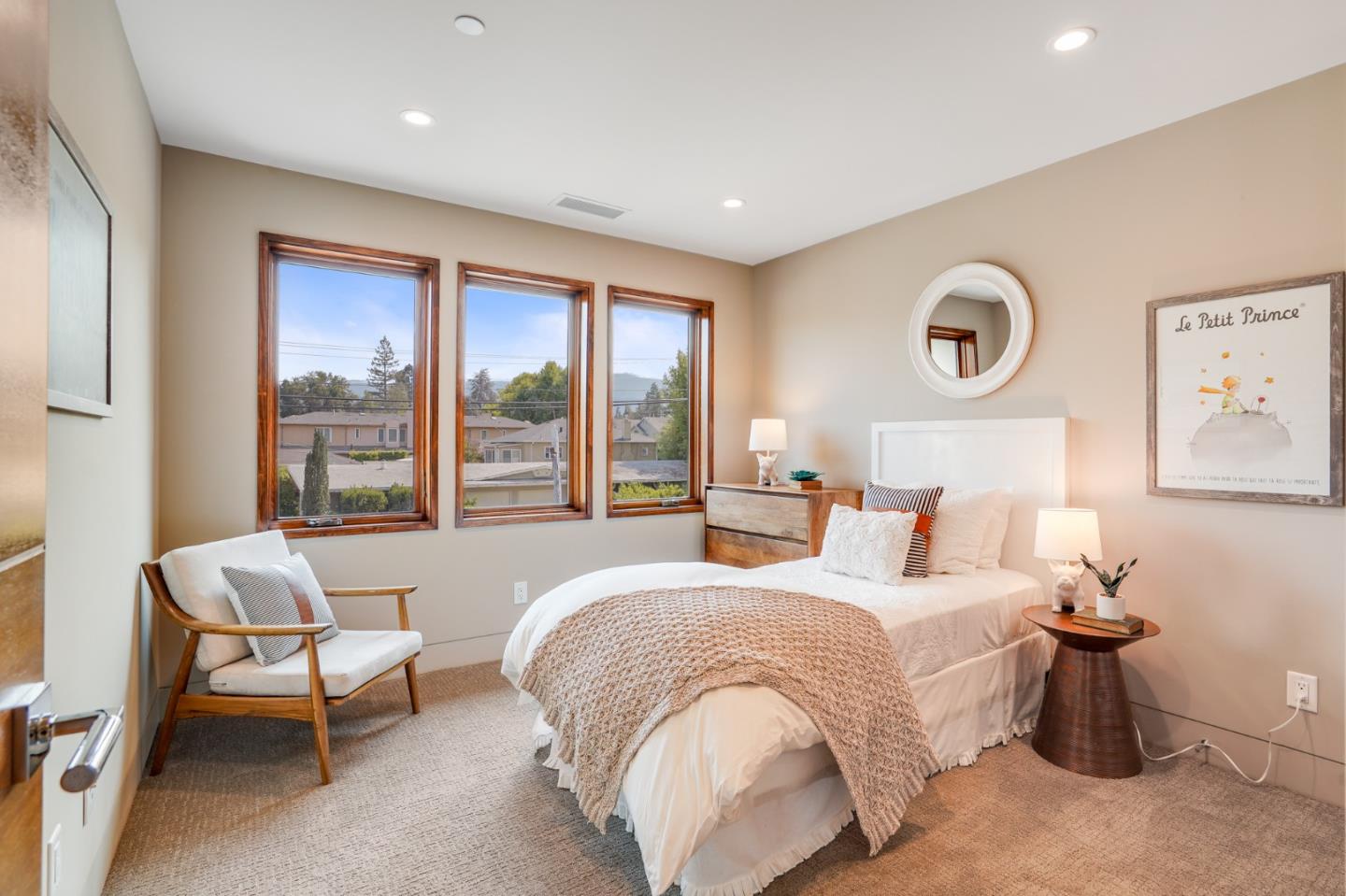 67 Lyell Street Los Altos, CA 94022 - Photo 20 of 31 a bedroom with a bed and a large window