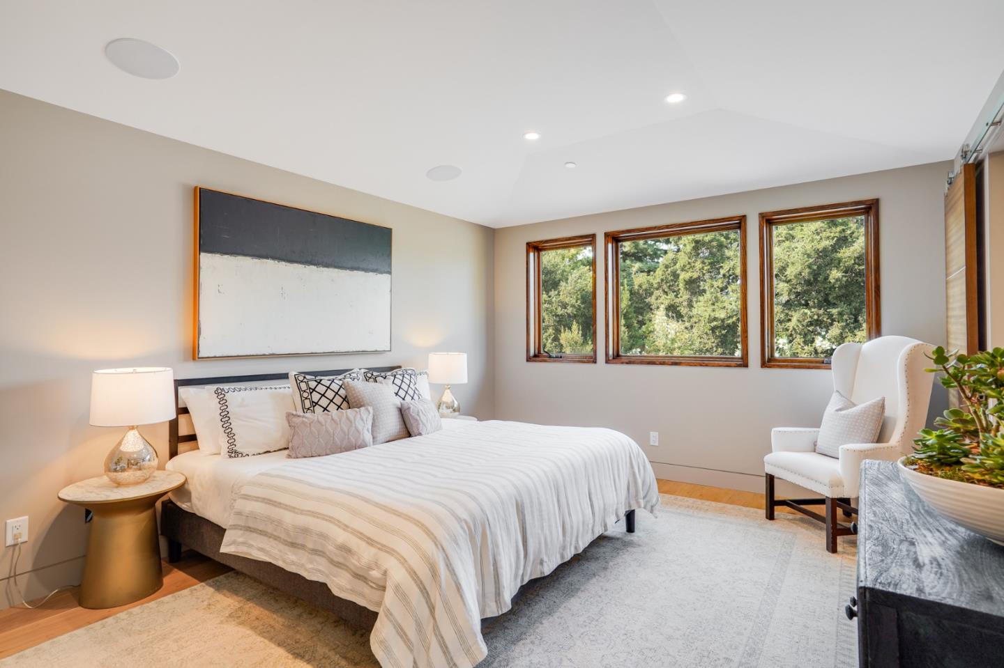 67 Lyell Street Los Altos, CA 94022 - Photo 25 of 31 a bedroom with a bed and a couch