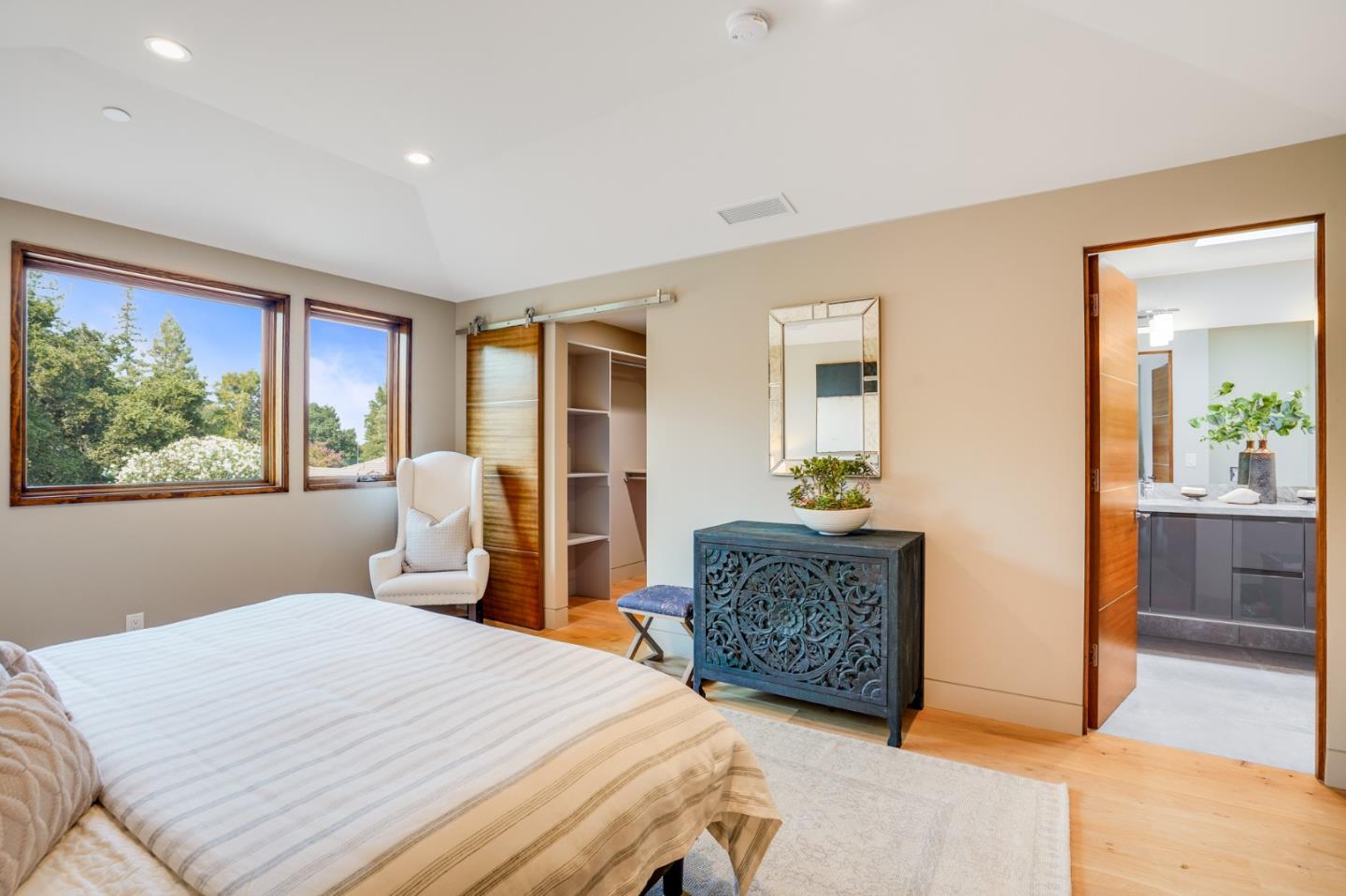 67 Lyell Street Los Altos, CA 94022 - Photo 26 of 31 a bedroom with a bed and wooden floor
