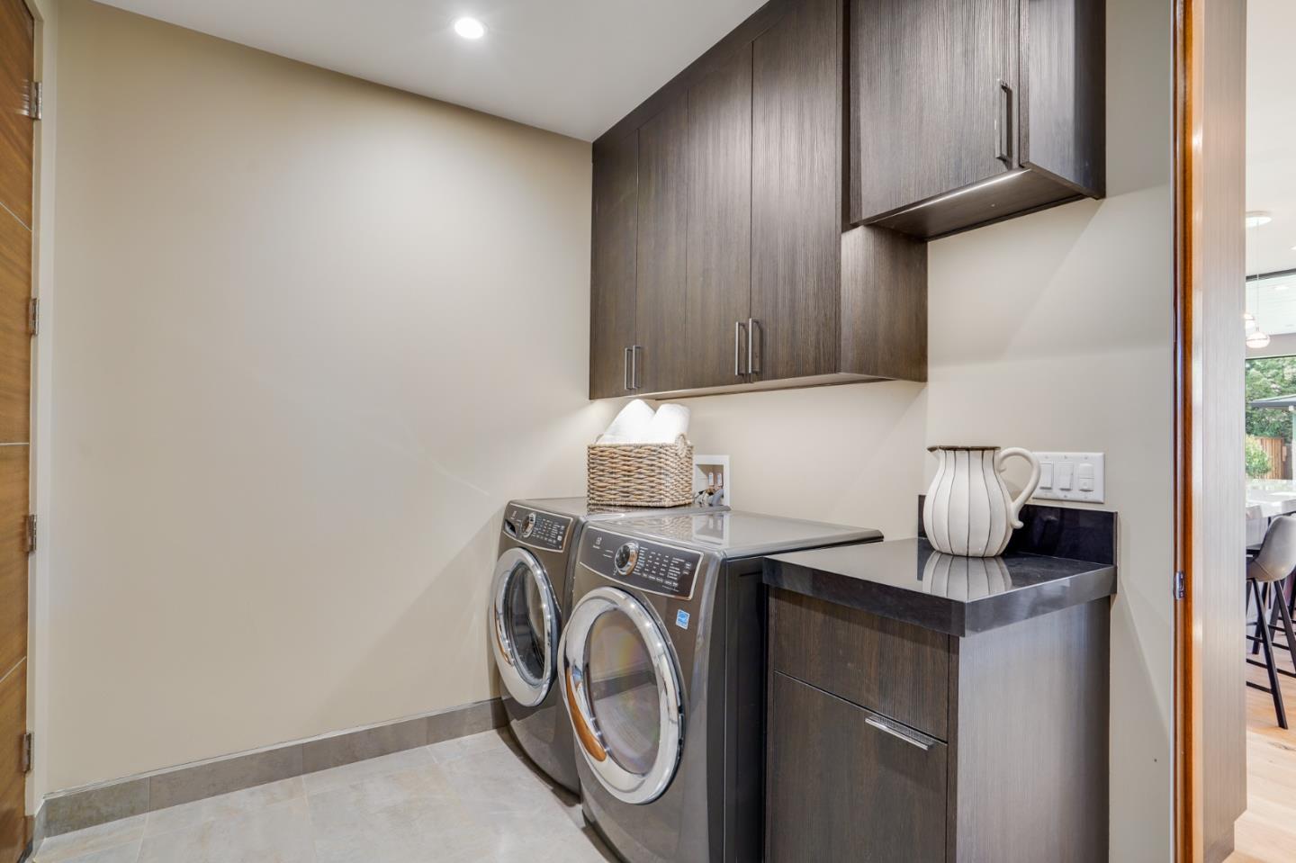 67 Lyell Street Los Altos, CA 94022 - Photo 30 of 31 a utility room with dryer and washer