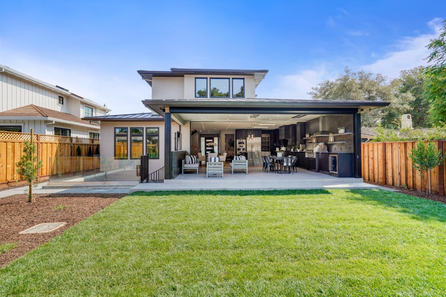 67 Lyell Street Los Altos, CA 94022 - Photo 4 of 31 a view of a swimming pool with furniture