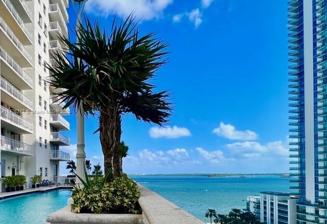 1200 Brickell Bay Drive, Unit 2008 Miami, FL 33131 - Photo 26 of 37 a view of a yard with a house in the background