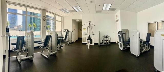 1200 Brickell Bay Drive, Unit 2008 Miami, FL 33131 - Photo 33 of 37 a view of a room with gym equipment