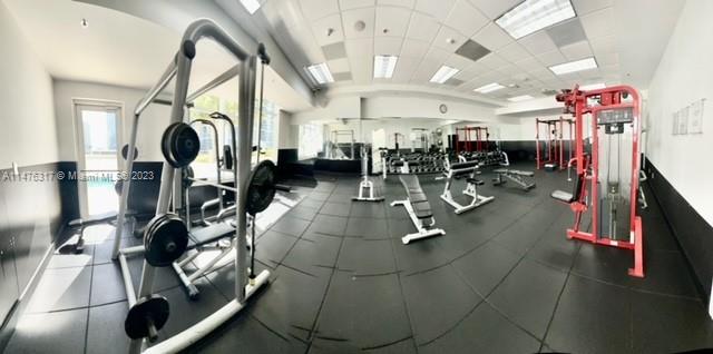 1200 Brickell Bay Drive, Unit 2008 Miami, FL 33131 - Photo 34 of 37 a view of a room with gym equipment