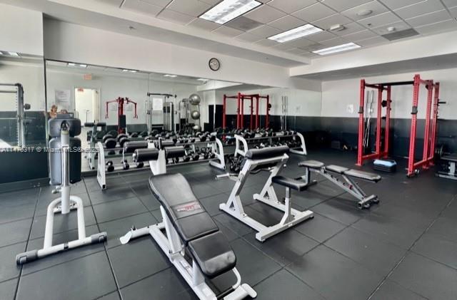 1200 Brickell Bay Drive, Unit 2008 Miami, FL 33131 - Photo 35 of 37 a view of a room with gym equipment