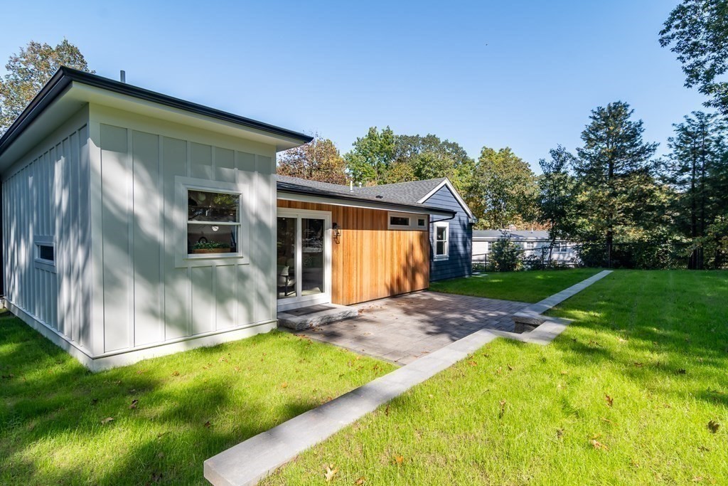 28 Perry Drive Needham, MA 02492 - Photo 30 of 35 a view of backyard of house with green space