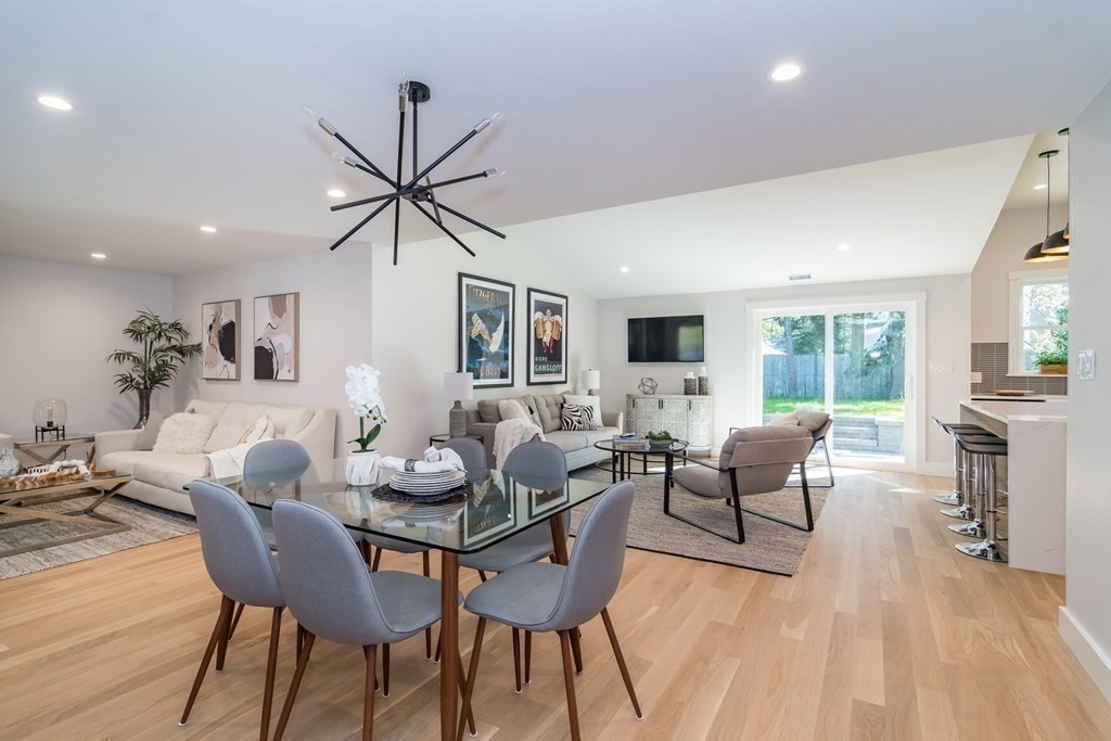 28 Perry Drive Needham, MA 02492 - Photo 7 of 35 a dining room with furniture window and wooden floor