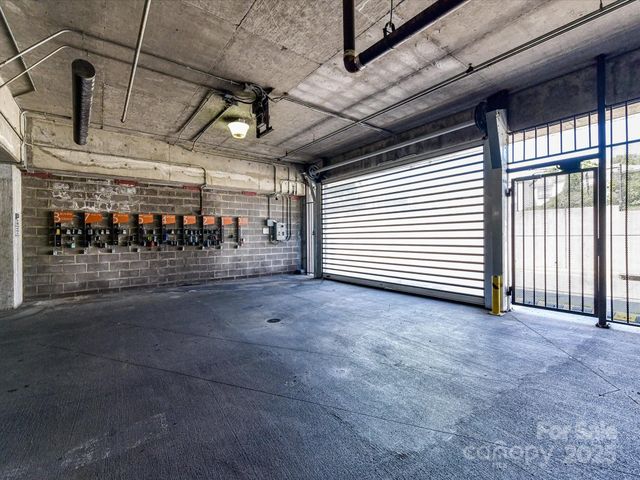 a front view of a house with garage