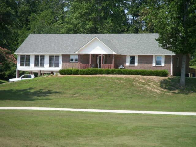 Beautiful home with circular drive. and carport.