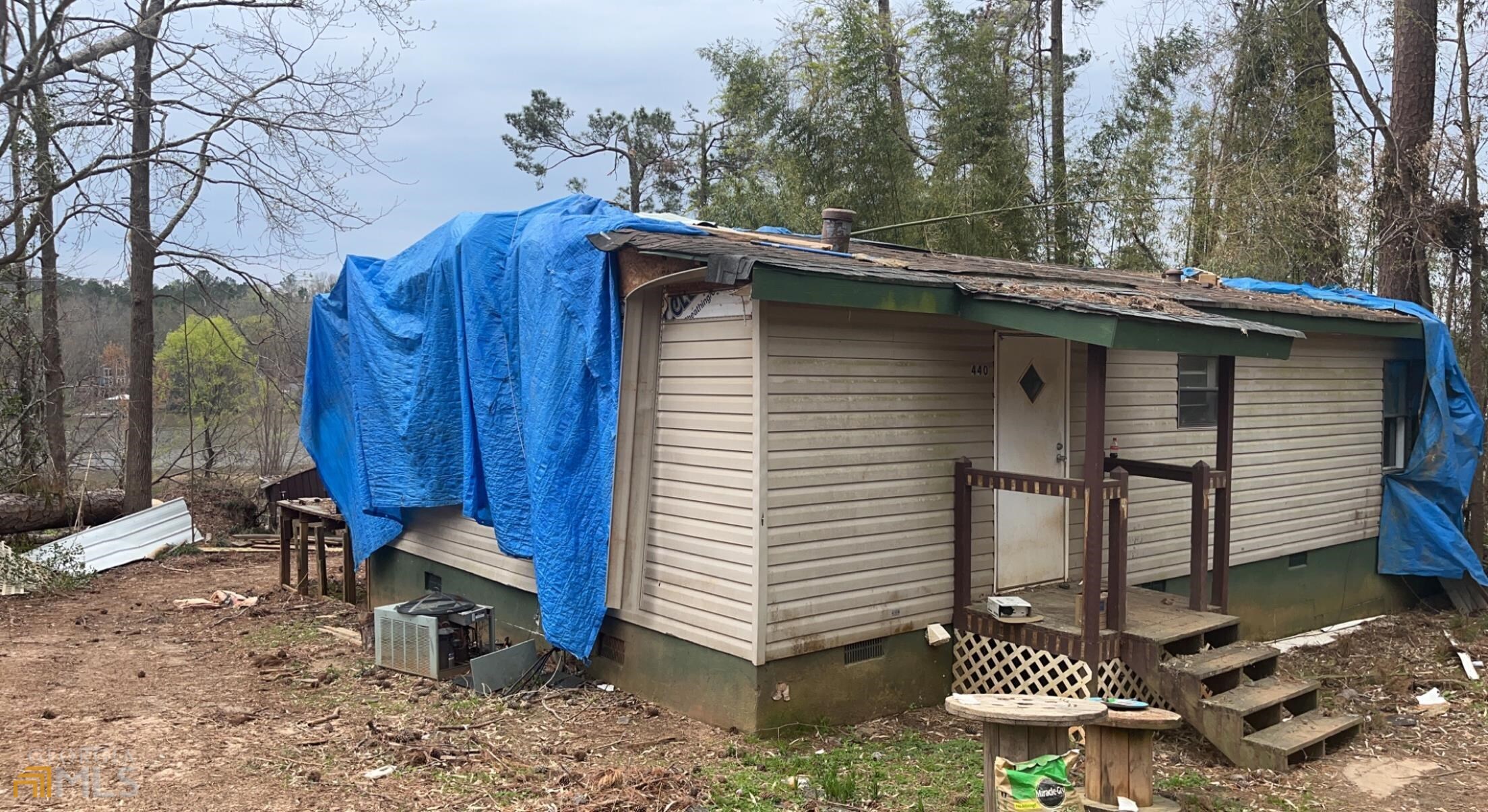440 Parker Road Covington, GA 30014 - Photo 1 of 1 a view of a house with a yard and wooden fence
