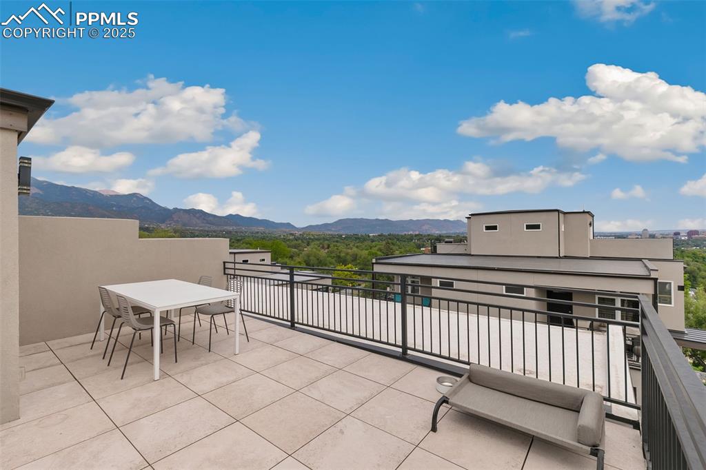 50 Sommerlyn Road Colorado Springs, CO 80906 - Photo 31 of 39 a view of a terrace with sitting area