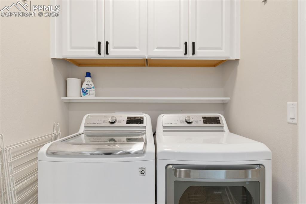 50 Sommerlyn Road Colorado Springs, CO 80906 - Photo 34 of 39 a close view of washer and dryer