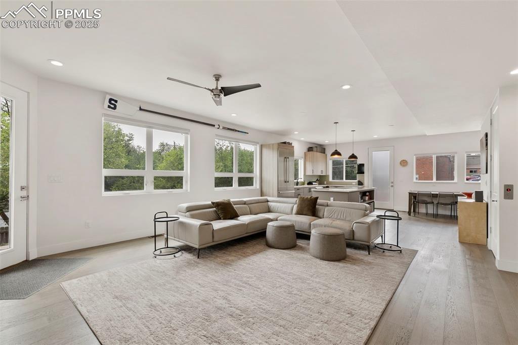 50 Sommerlyn Road Colorado Springs, CO 80906 - Photo 4 of 39 a living room with furniture and wooden floor