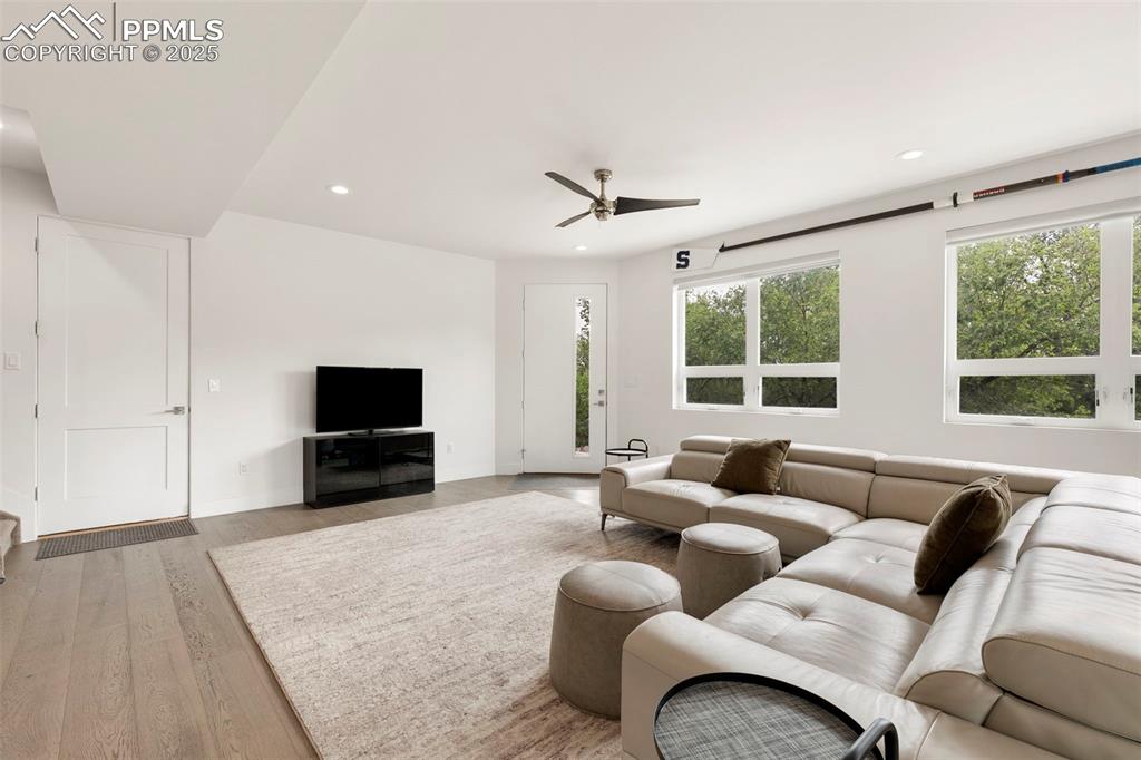 50 Sommerlyn Road Colorado Springs, CO 80906 - Photo 5 of 39 a living room with furniture and a flat screen tv