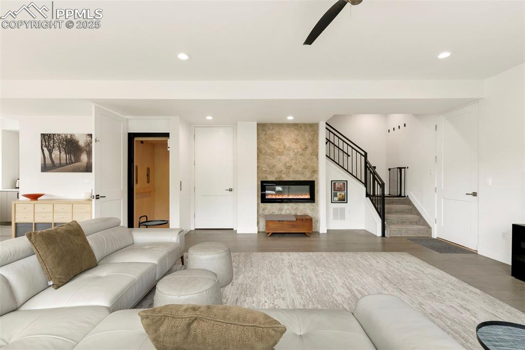 50 Sommerlyn Road Colorado Springs, CO 80906 - Photo 6 of 39 a living room with furniture and wooden floor