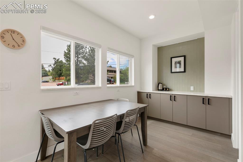50 Sommerlyn Road Colorado Springs, CO 80906 - Photo 9 of 39 a view of a dining room with furniture and window