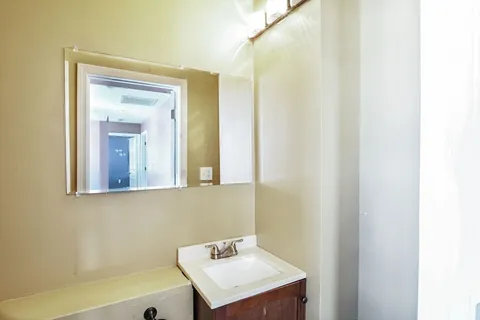 a bathroom with a sink and a bathtub