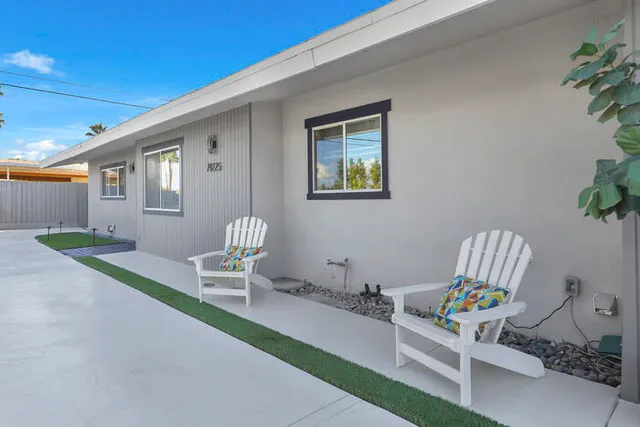 a chairs and a table in a patio