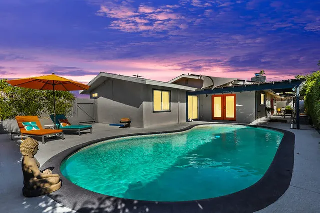 a view of a backyard with a patio