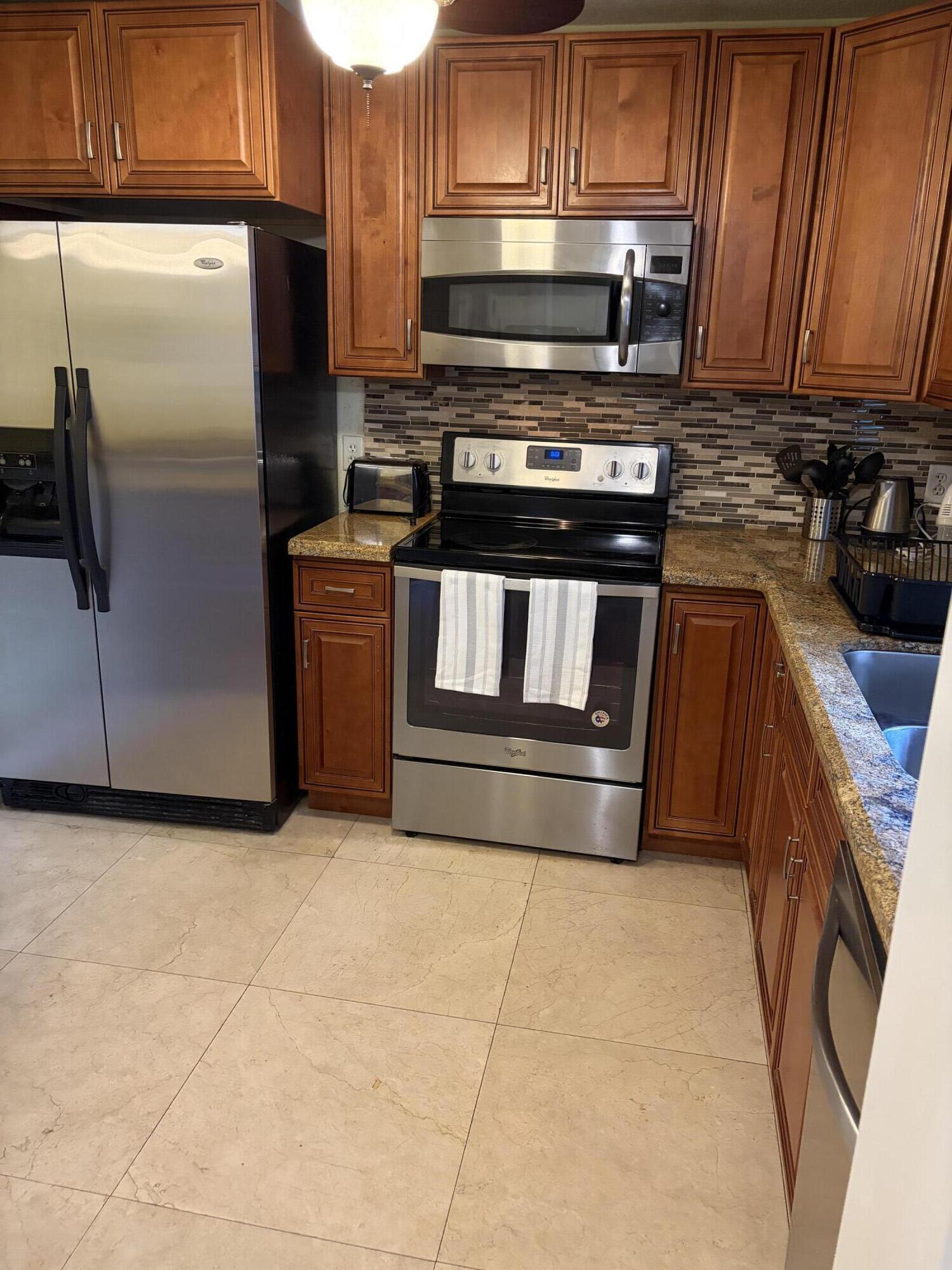9273 Southwest 8th Street, Unit 201 Boca Raton, FL 33428 - Photo 2 of 14 IMG_9326