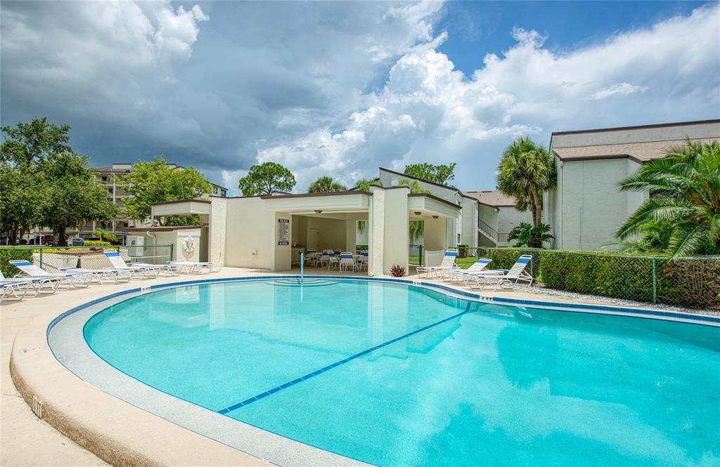 700 Starkey Road, Unit 1145 Largo, FL 33771 - Photo 47 of 63 a view of swimming pool is middle in the garden