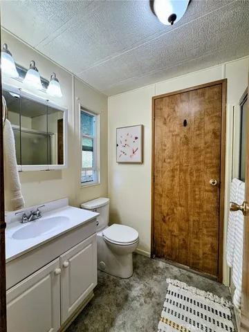 a bathroom with a sink and a shower