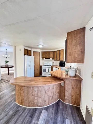 a room with furniture and wooden floor