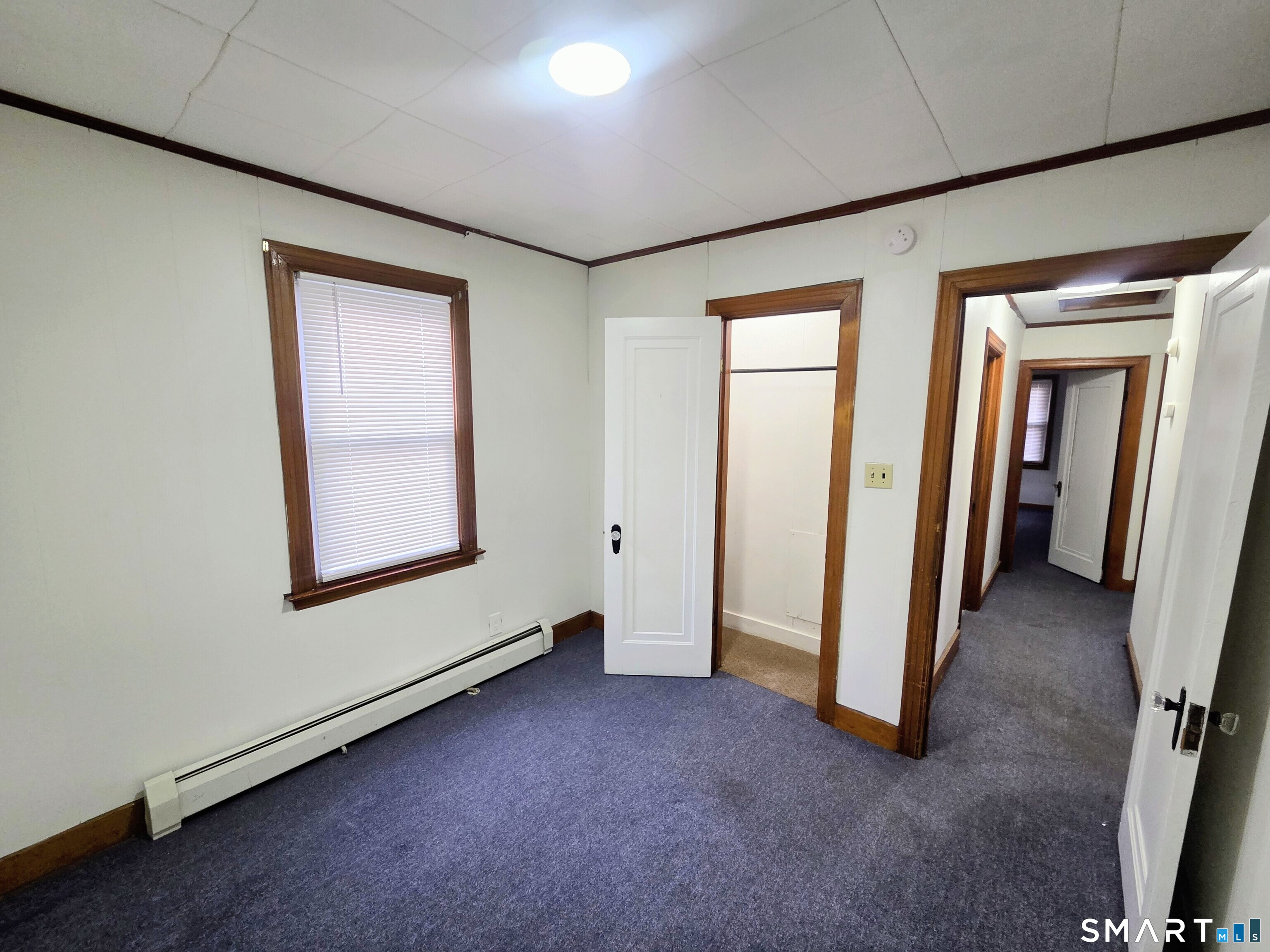 387 Putnam Pike Killingly, CT 06241 - Photo 11 of 17 an empty room with windows