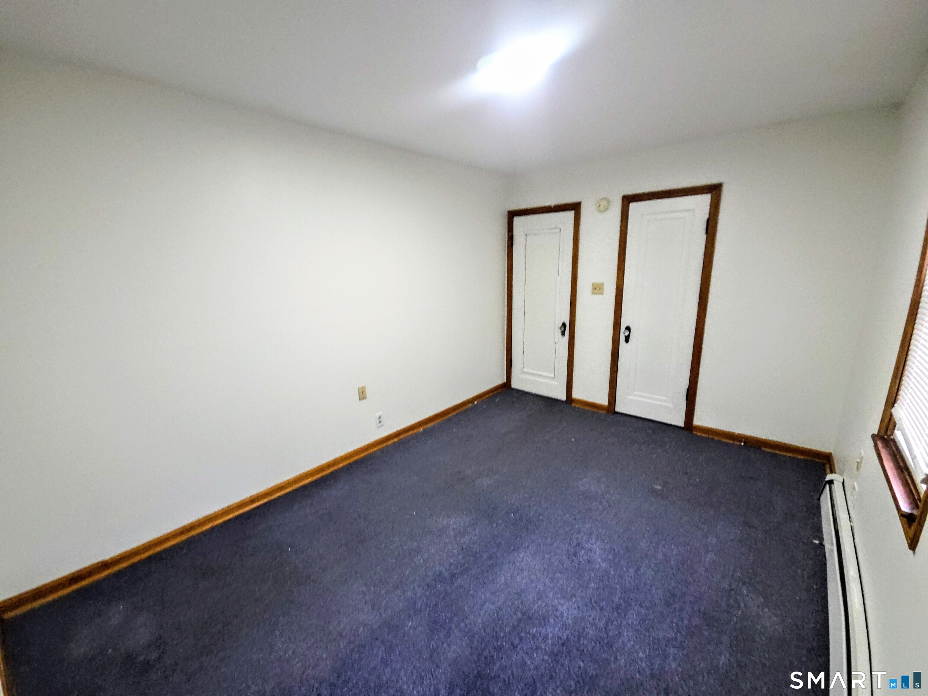 387 Putnam Pike Killingly, CT 06241 - Photo 15 of 17 an empty room with a window
