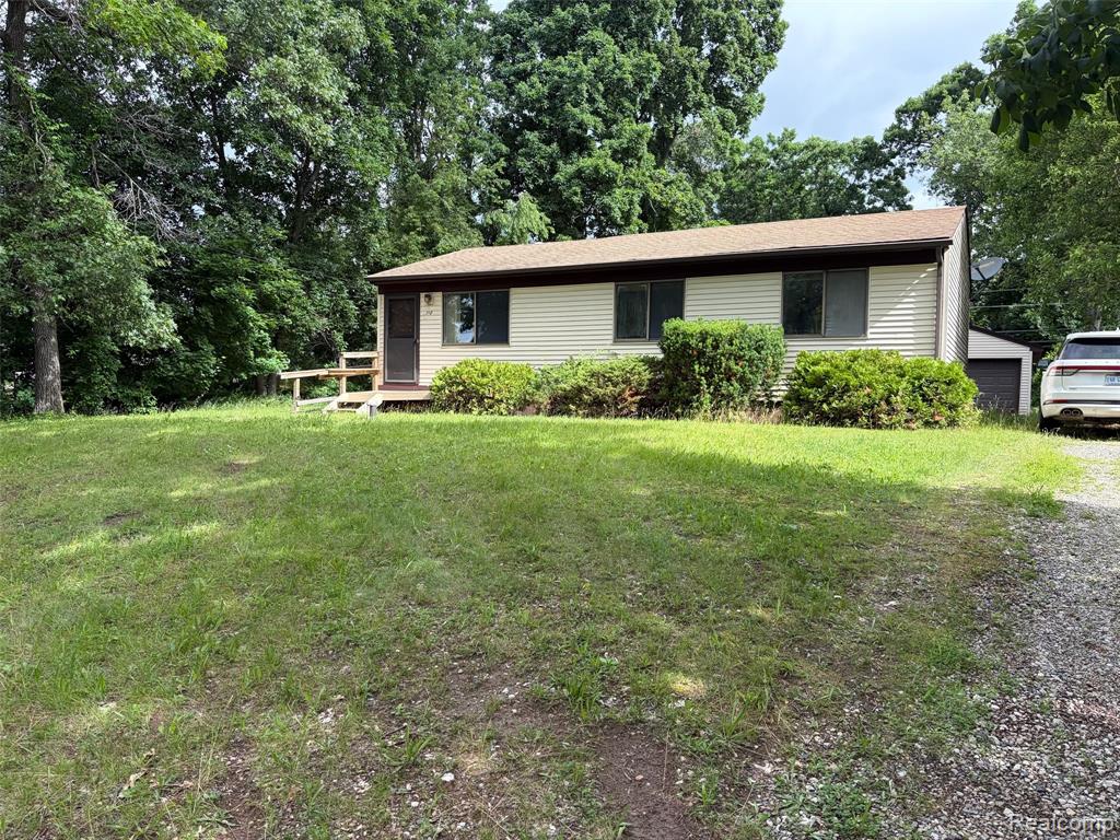 718 West Baker Road Highland, MI 48357 - Photo 1 of 7